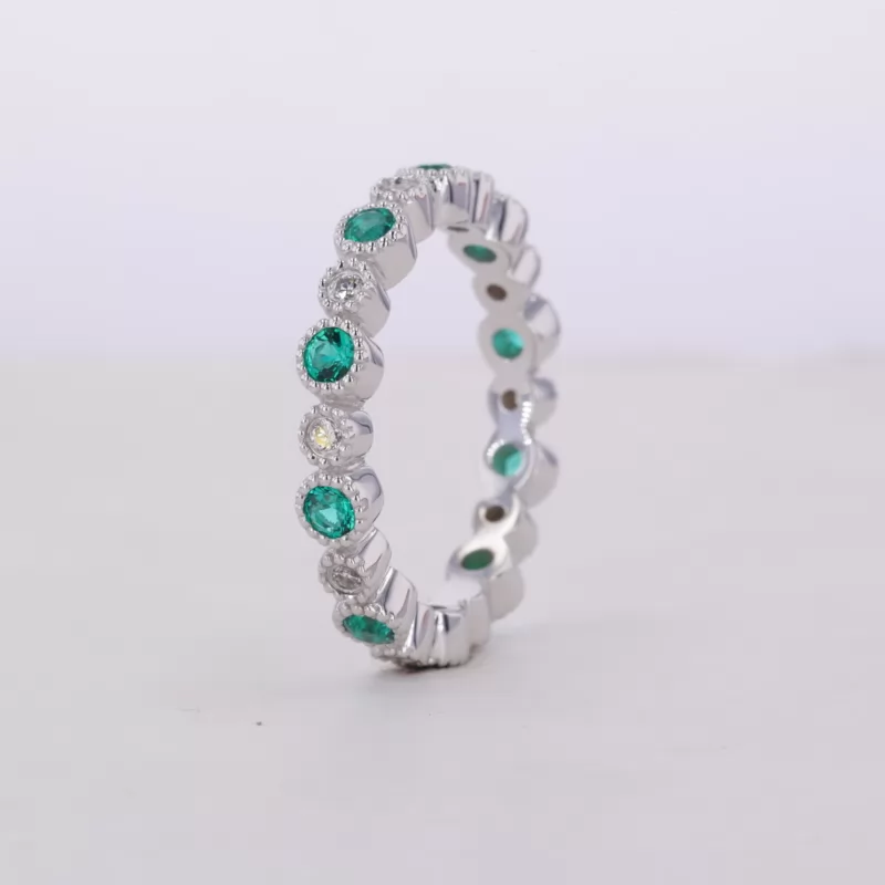 2.5mm Round Brilliant Cut Lab Grown Emerald & 2mm Round Brilliant Cut Moissanite Bezel Set 14K White Gold Diamond Eternity Ring